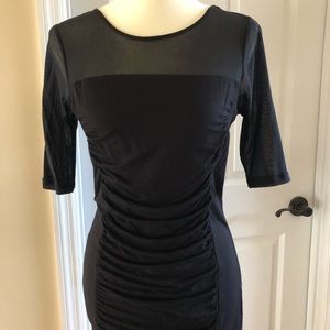 EUC - worn once. INC sheer rayon spandex top.